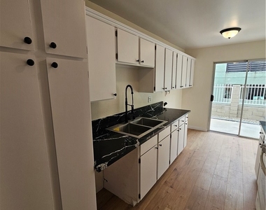 7124 Valmont Street - Photo Thumbnail 2
