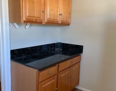 4535 W 11th Place - Photo Thumbnail 8