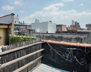 East 13th Street - Photo Thumbnail 1