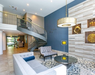 100 Cuttermill Road - Photo Thumbnail 2