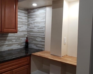 131-02 107th Avenue - Photo Thumbnail 2