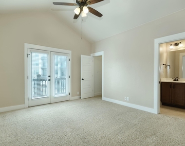 7320 Easy Wind Dr - Photo Thumbnail 4