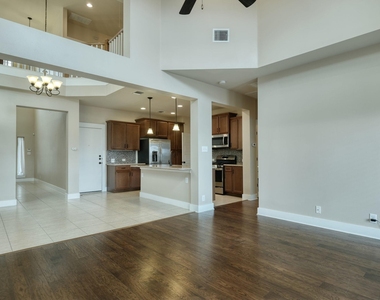 7320 Easy Wind Dr - Photo Thumbnail 2