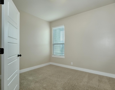 7320 Easy Wind Dr - Photo Thumbnail 8
