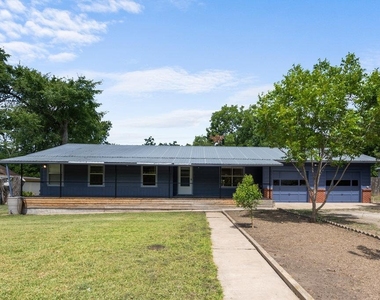 8908 Capitol Dr - Photo Thumbnail 1