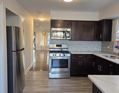 16007 Vine Avenue - Photo Thumbnail 6
