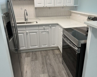 16 E Old Willow Road - Photo Thumbnail 4