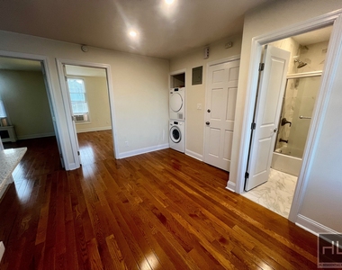 6921 6 Avenue - Photo Thumbnail 3