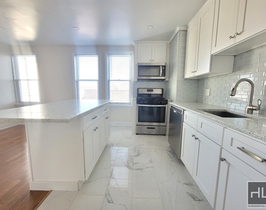 6921 6 Avenue - Photo Thumbnail 2