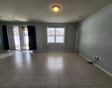 15734 Stone House Drive - Photo Thumbnail 3