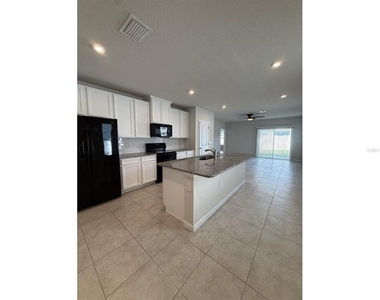 11921 Bristol Bridge Road - Photo Thumbnail 5