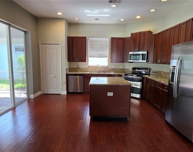 11609 Greensleeve Avenue - Photo Thumbnail 16