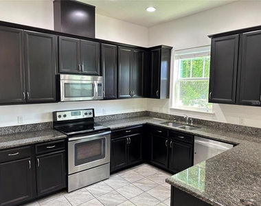 9350 Woodcrane Drive - Photo Thumbnail 5