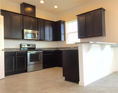 9350 Woodcrane Drive - Photo Thumbnail 4