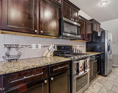 14745 Orsten Artis Avenue - Photo Thumbnail 14