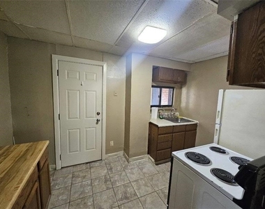1907 Delaware Ave - Photo Thumbnail 5