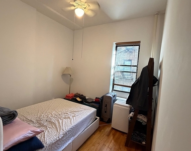 W 56th St - Photo Thumbnail 5