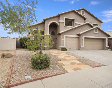 7775 N 52nd Drive - Photo Thumbnail 1