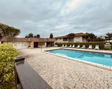 9911 Sandalfoot Boulevard - Photo Thumbnail 10