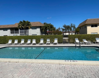 9911 Sandalfoot Boulevard - Photo Thumbnail 9