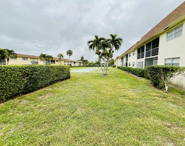9911 Sandalfoot Boulevard - Photo Thumbnail 11