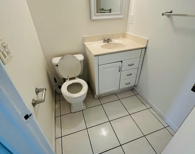 9911 Sandalfoot Boulevard - Photo Thumbnail 4