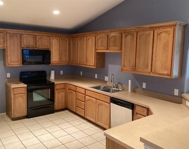 11912 Porcupine Drive - Photo Thumbnail 3