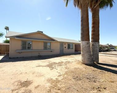 2027 N 66th Drive - Photo Thumbnail 1