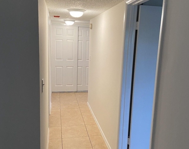 605 S Pine Island Road - Photo Thumbnail 5