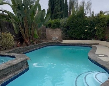 14320 Hortense Street - Photo Thumbnail 1