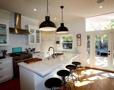 555 Bluebird Canyon Drive - Photo Thumbnail 1