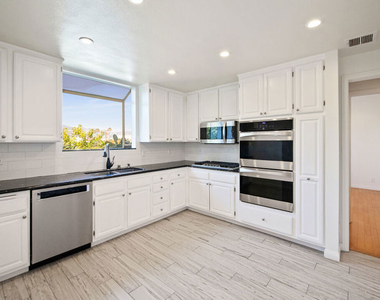 200 N Almont Drive - Photo Thumbnail 2