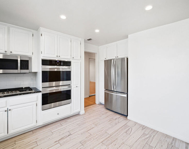 200 N Almont Drive - Photo Thumbnail 1