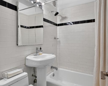 220 W 15th Street - Photo Thumbnail 4
