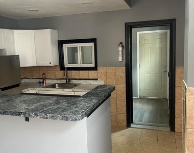 2106 S Shields Street - Photo Thumbnail 3