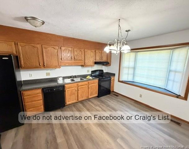 7796 Adrian Drive - Photo Thumbnail 4