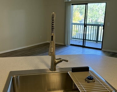 7667 N Wickham Road - Photo Thumbnail 5