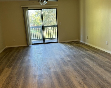 7667 N Wickham Road - Photo Thumbnail 3
