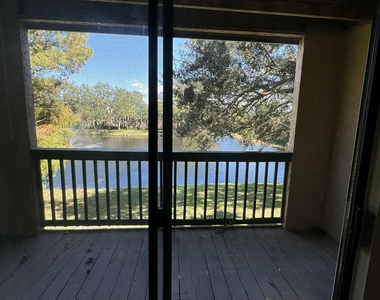 7667 N Wickham Road - Photo Thumbnail 2