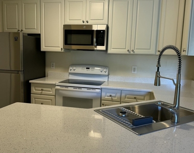 7667 N Wickham Road - Photo Thumbnail 6
