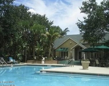 7667 N Wickham Road - Photo Thumbnail 9