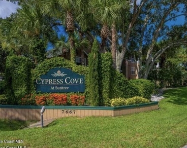 7667 N Wickham Road - Photo Thumbnail 1