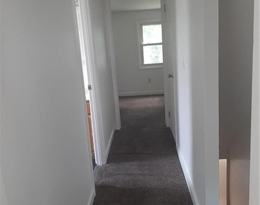 824 E 8th Street E - Photo Thumbnail 7
