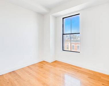 55-27 Myrtle Avenue - Photo Thumbnail 4