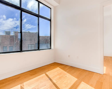 55-27 Myrtle Avenue - Photo Thumbnail 2