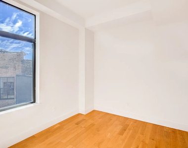 55-27 Myrtle Avenue - Photo Thumbnail 5