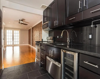 102 East 7th Street - Photo Thumbnail 4