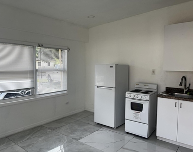 1212 Nw 13th Court - Photo Thumbnail 1