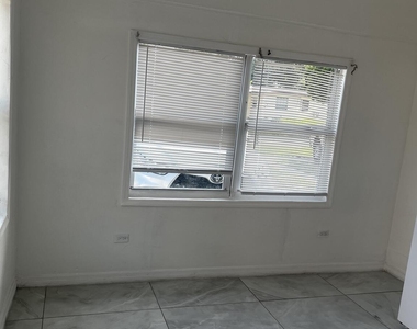 1212 Nw 13th Court - Photo Thumbnail 2