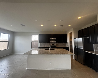 7053 W Oberlin Way - Photo Thumbnail 12